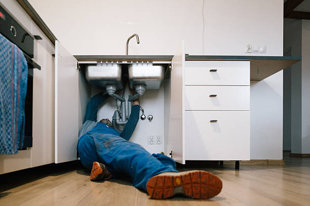 Professional Drain Cleaning technician working in Methuen, MA